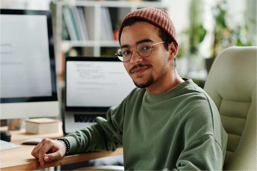 A young professional at a work desk