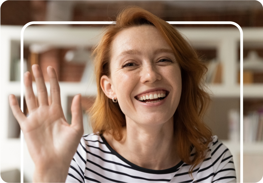 Smiling woman waving