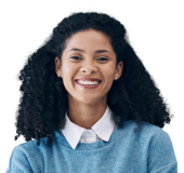 A businessperson in a blue sweater smiles