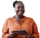 A smiling woman holding a notepad