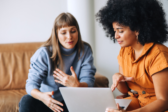Smiling professional holding an ipad