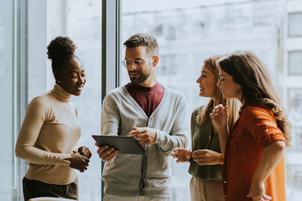 2 colleagues working at a laptop