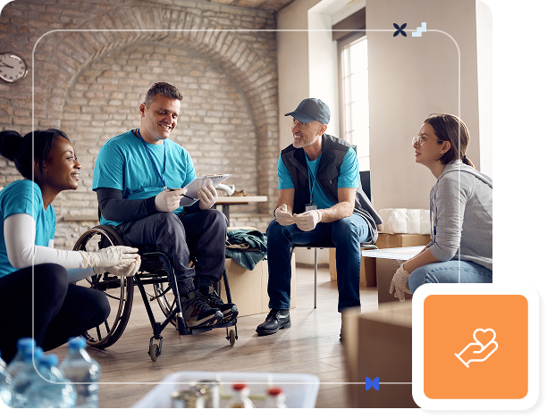 A group of people meet in a room