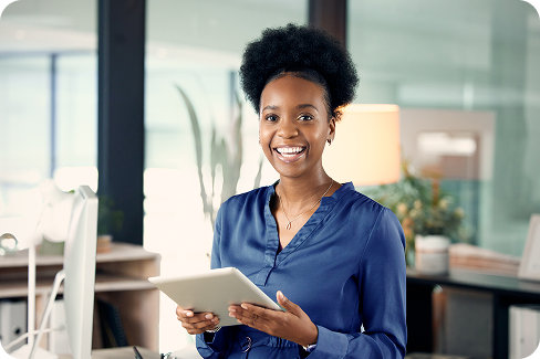 Smiling female holding an ipad