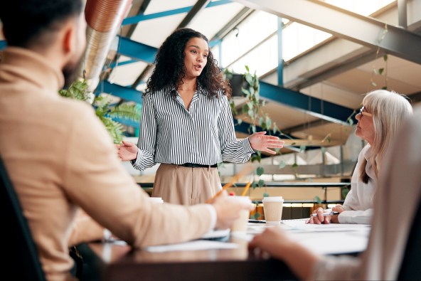 Smiling professional holding an ipad