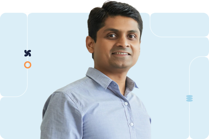 Smiling professional with arms crossed