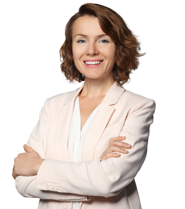 Smiling woman in a suit crossing her arms