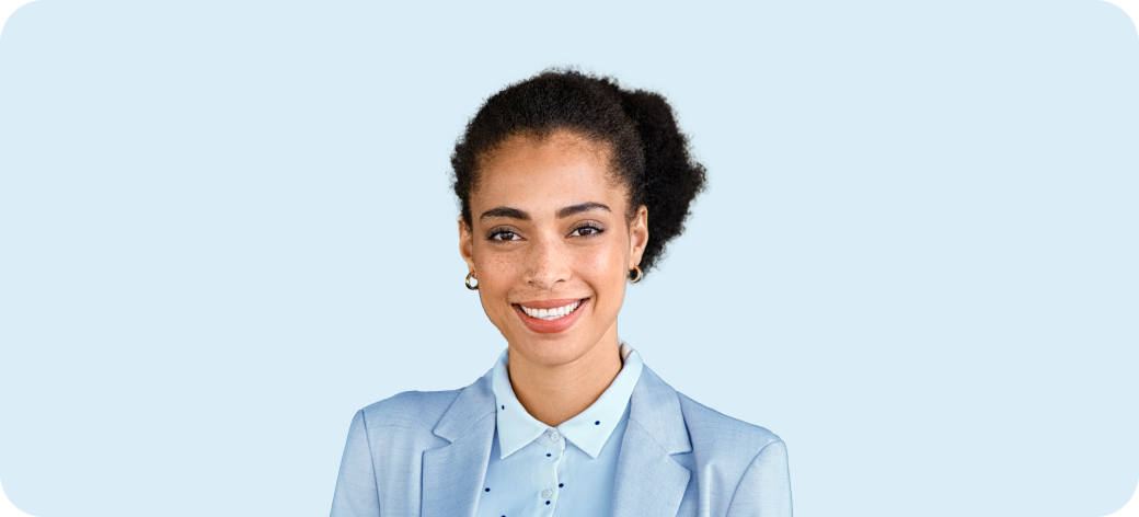 Smiling professional in light blue background