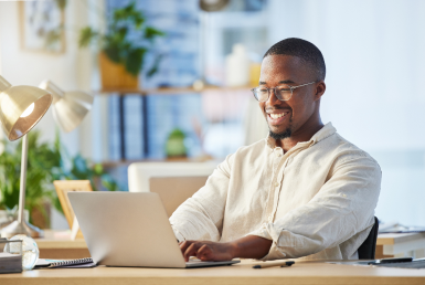 What-is-agile_Upskill with agile today A young professional seated with his laptop